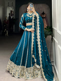 Magnificent Teal Blue Embroidered Vichitra Silk Engagement Wear Lehenga Choli