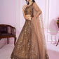 Attractive Brown Sequins Soft Net Engagement Wear Lehenga Choli
