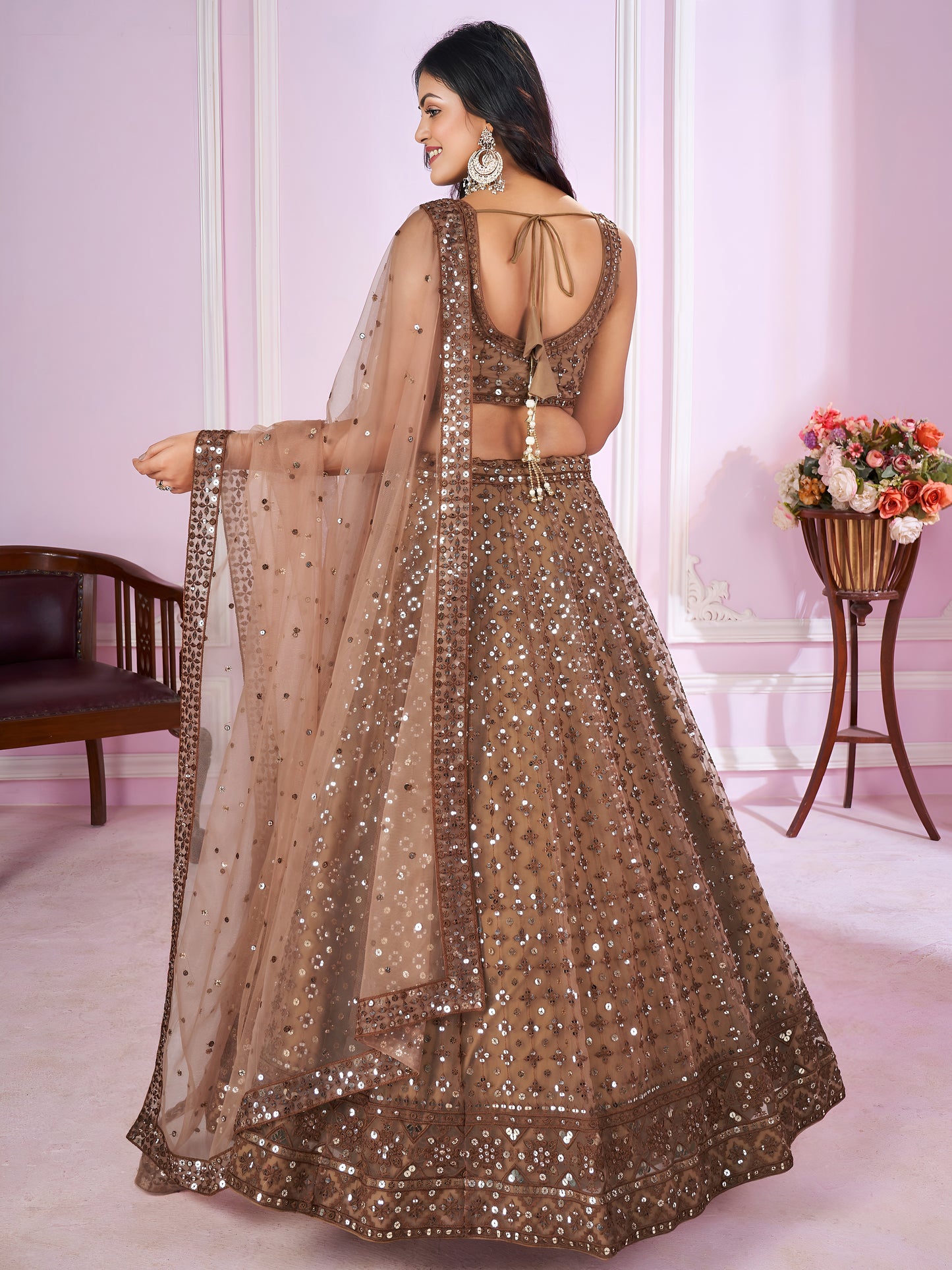 Attractive Brown Sequins Soft Net Engagement Wear Lehenga Choli