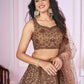 Attractive Brown Sequins Soft Net Engagement Wear Lehenga Choli