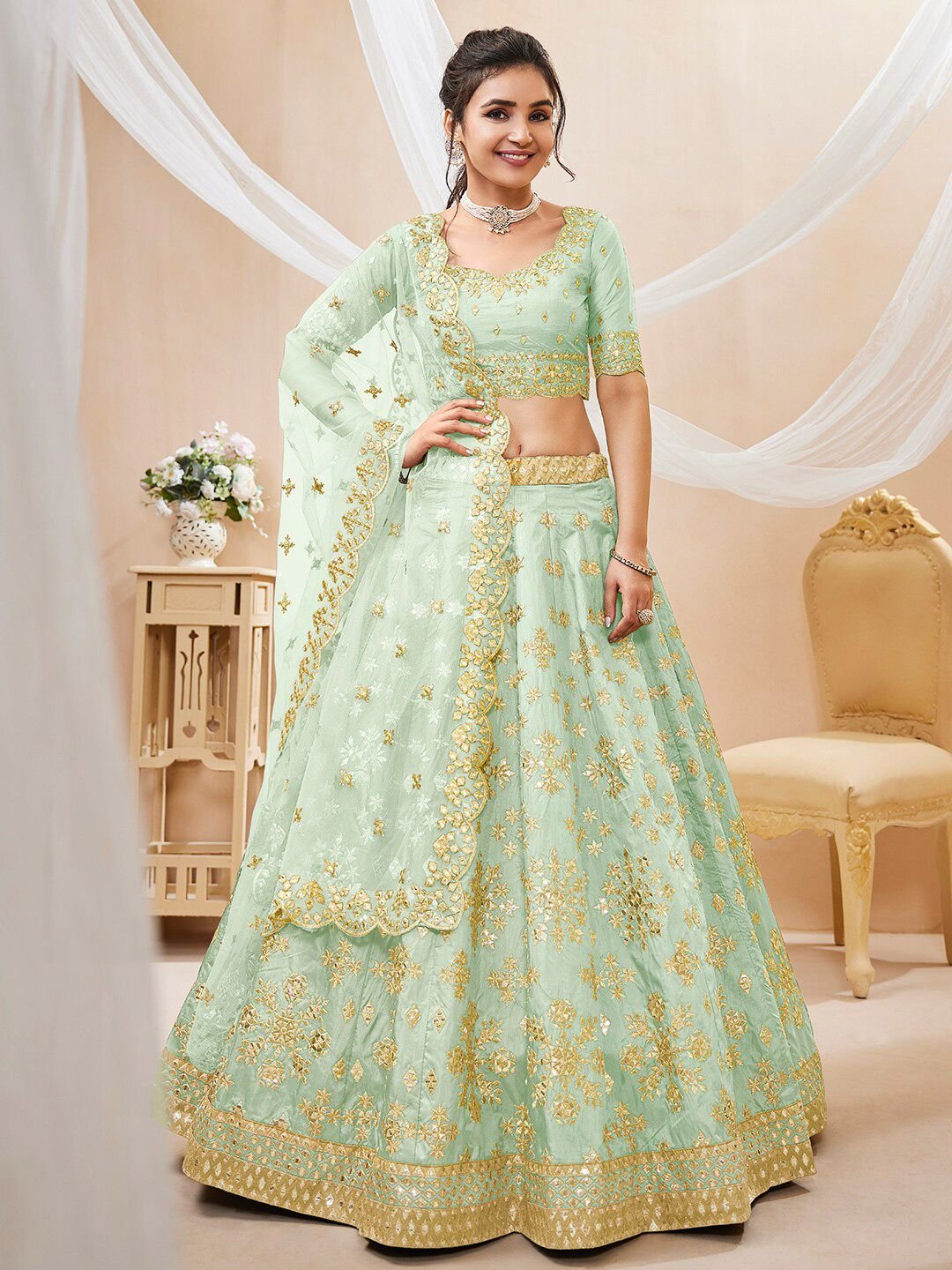 Pista green and gold-toned Embroidered Sequinned Semi-Stitched Lehenga & Unstitched Blouse With Dupatta
