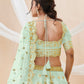 Pista green and gold-toned Embroidered Sequinned Semi-Stitched Lehenga & Unstitched Blouse With Dupatta
