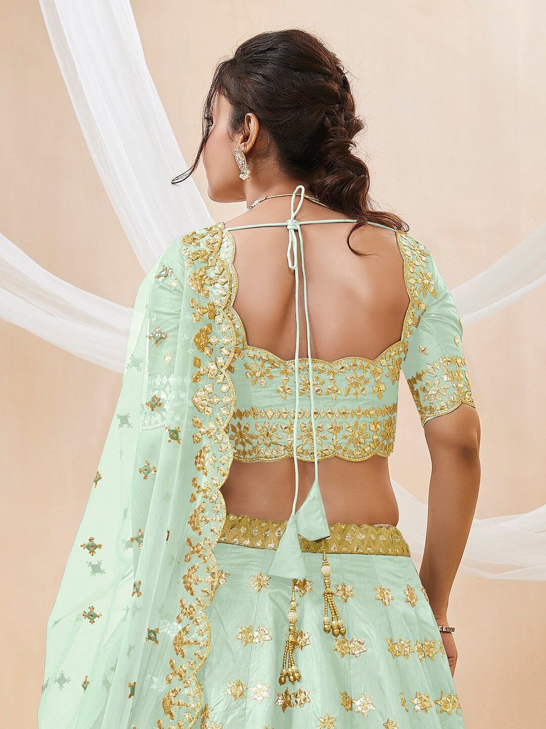 Pista green and gold-toned Embroidered Sequinned Semi-Stitched Lehenga & Unstitched Blouse With Dupatta