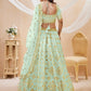 Pista green and gold-toned Embroidered Sequinned Semi-Stitched Lehenga & Unstitched Blouse With Dupatta