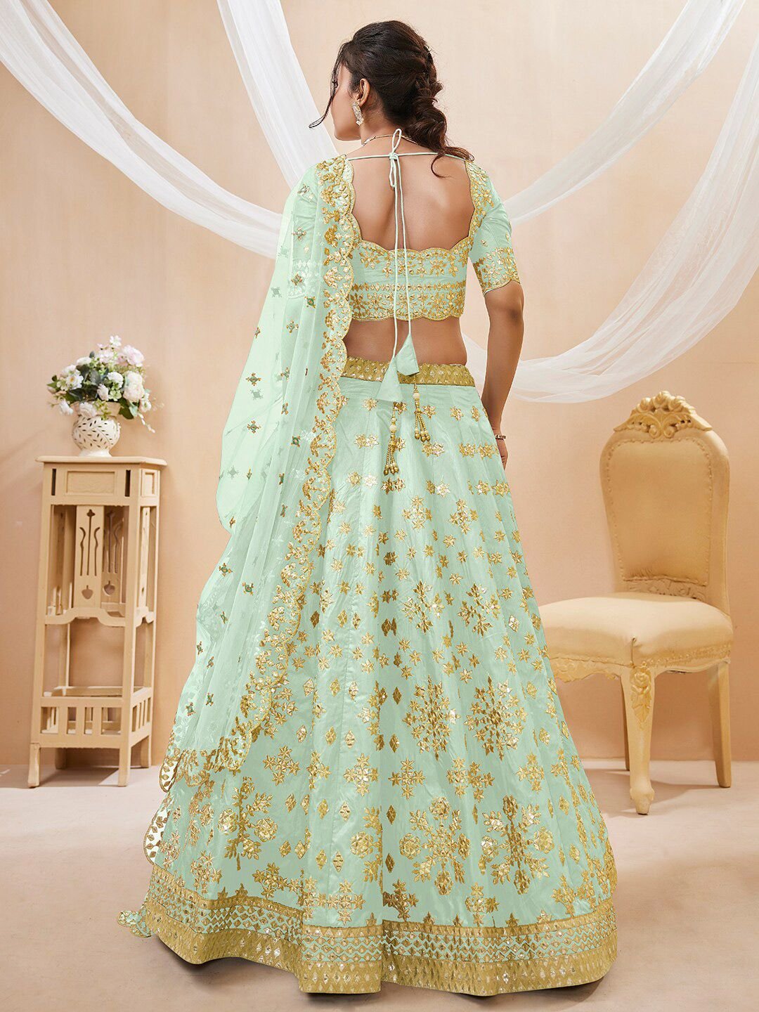 Pista green and gold-toned Embroidered Sequinned Semi-Stitched Lehenga & Unstitched Blouse With Dupatta