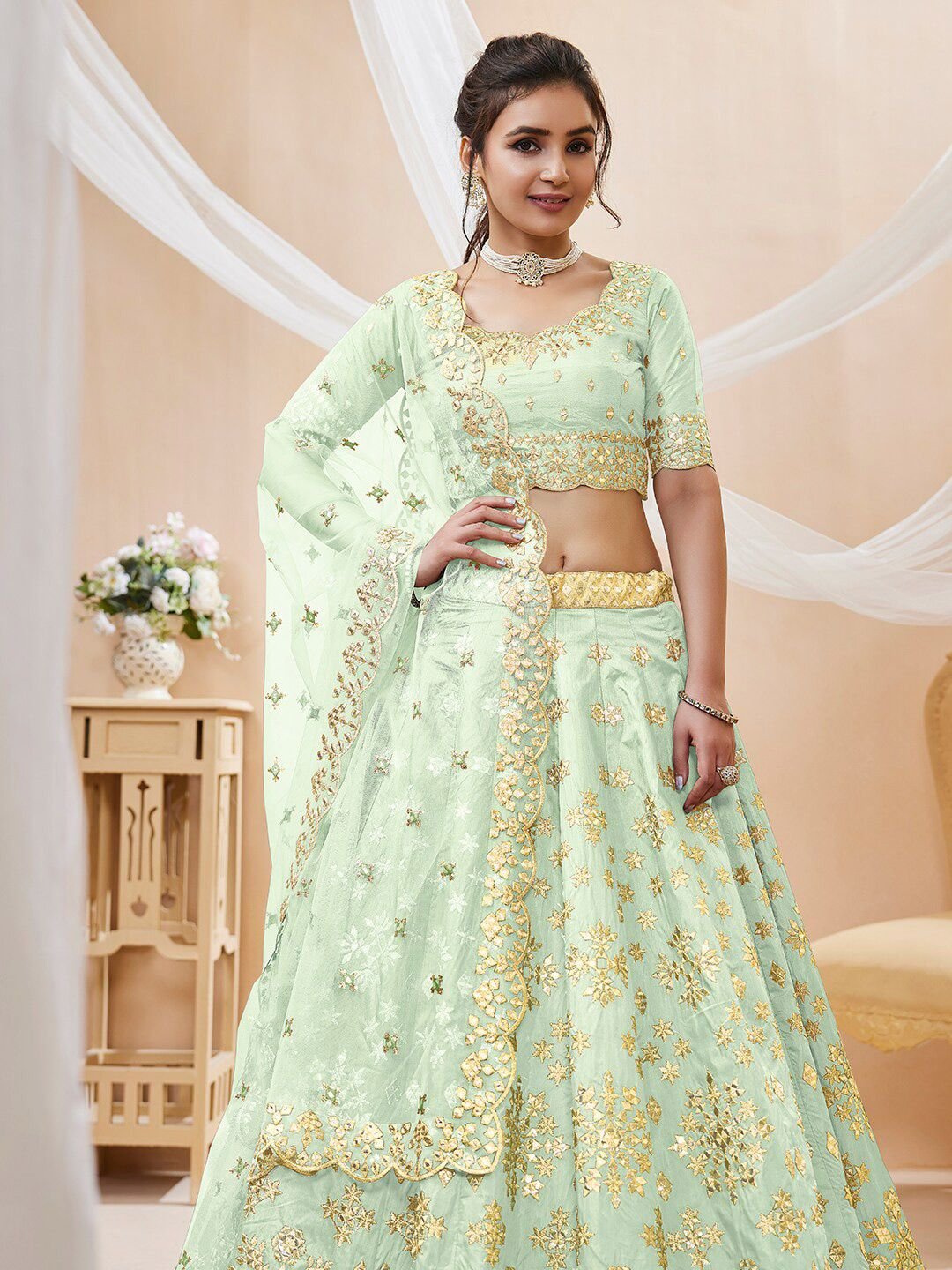 Pista green and gold-toned Embroidered Sequinned Semi-Stitched Lehenga & Unstitched Blouse With Dupatta