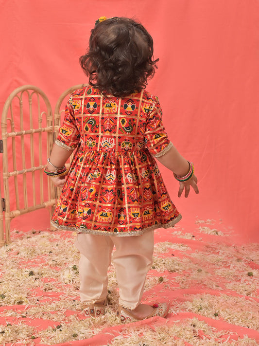 Girls' red angrakha style patola print kurta dhoti set, view 3