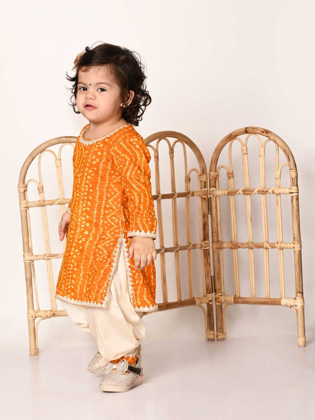Girl's Yellow Bandhni Print Kurta And Patiala Set