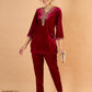 Women Maroon Ethnic Motifs Embroidered Kurti with Trousers