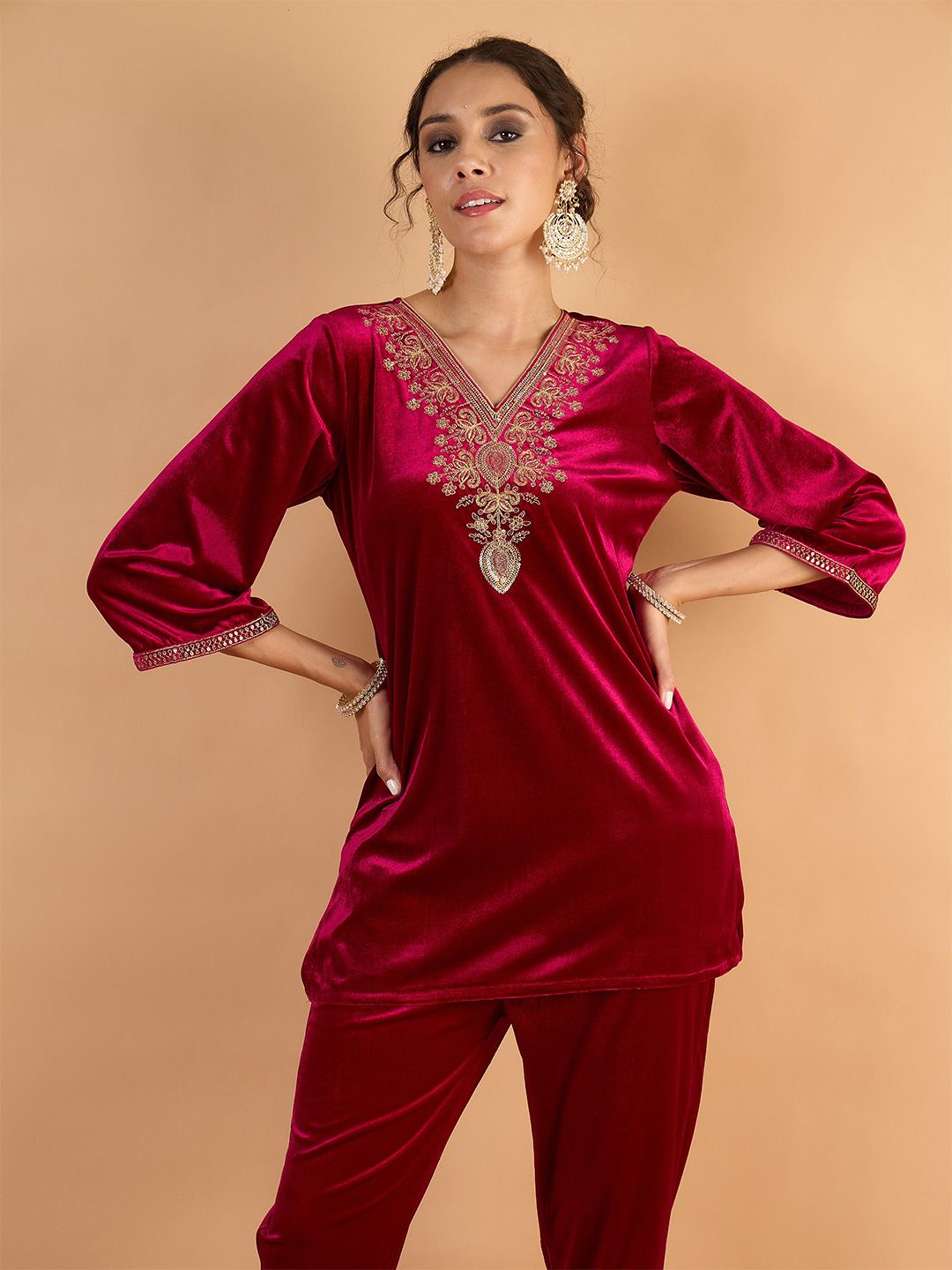 Women Ethnic Motifs Embroidered Kurti with Trousers