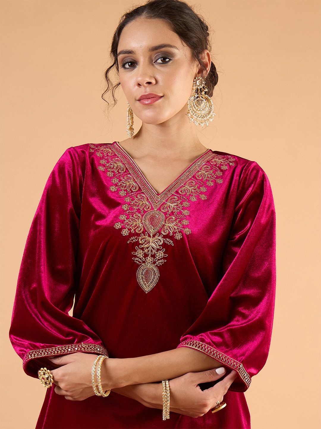 Women Ethnic Motifs Embroidered Kurti with Trousers