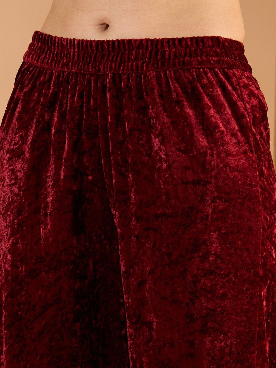 Women Ethnic Motifs Embroidered Zari Work Velvet Kurta with Trousers