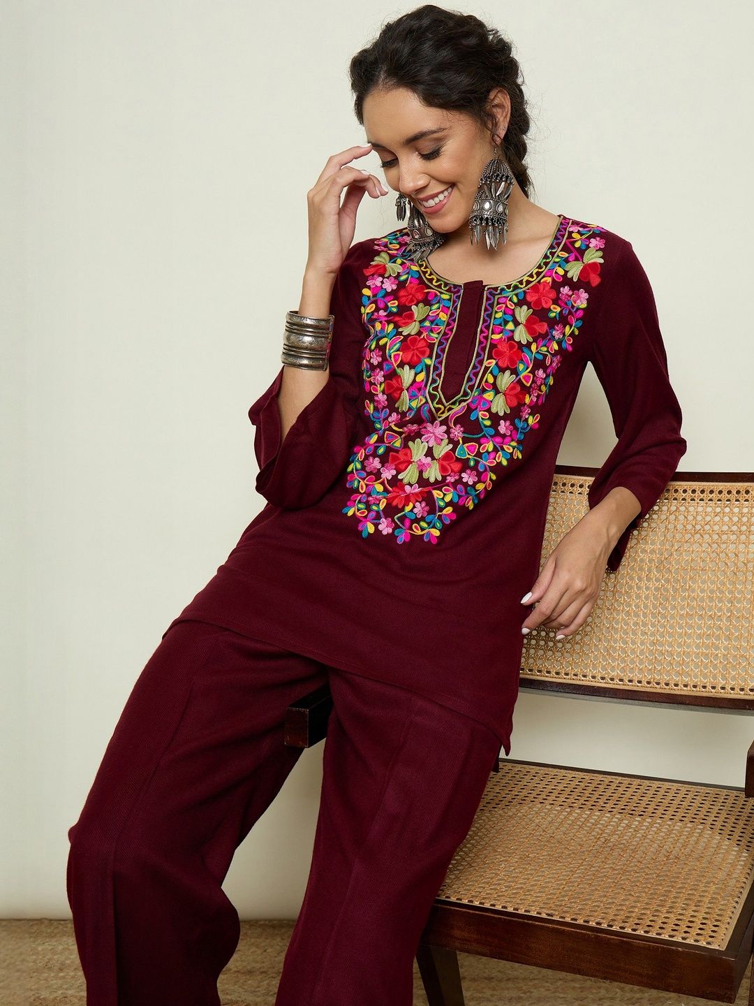 Women Floral Embroidered Woollen Kurta with Trousers