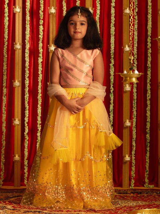 Girls' Pink Crop Top And Yellow Net Lehenga With Ruffled Dupatta Set