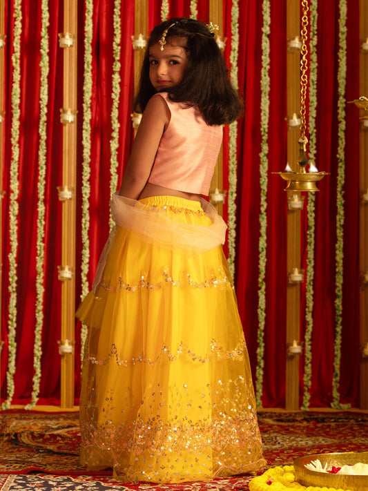 Girls' Pink Crop Top And Yellow Net Lehenga With Ruffled Dupatta Set