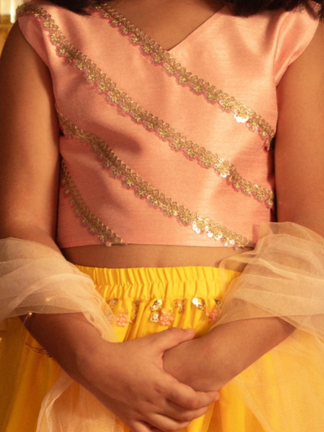 Girls' Pink Crop Top And Yellow Net Lehenga With Ruffled Dupatta Set