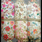 Handmade Indian embroidered potli bags featuring intricate floral designs.
