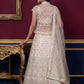 Beautiful Off-White Embroidered Net Party Wear Lehenga Choli