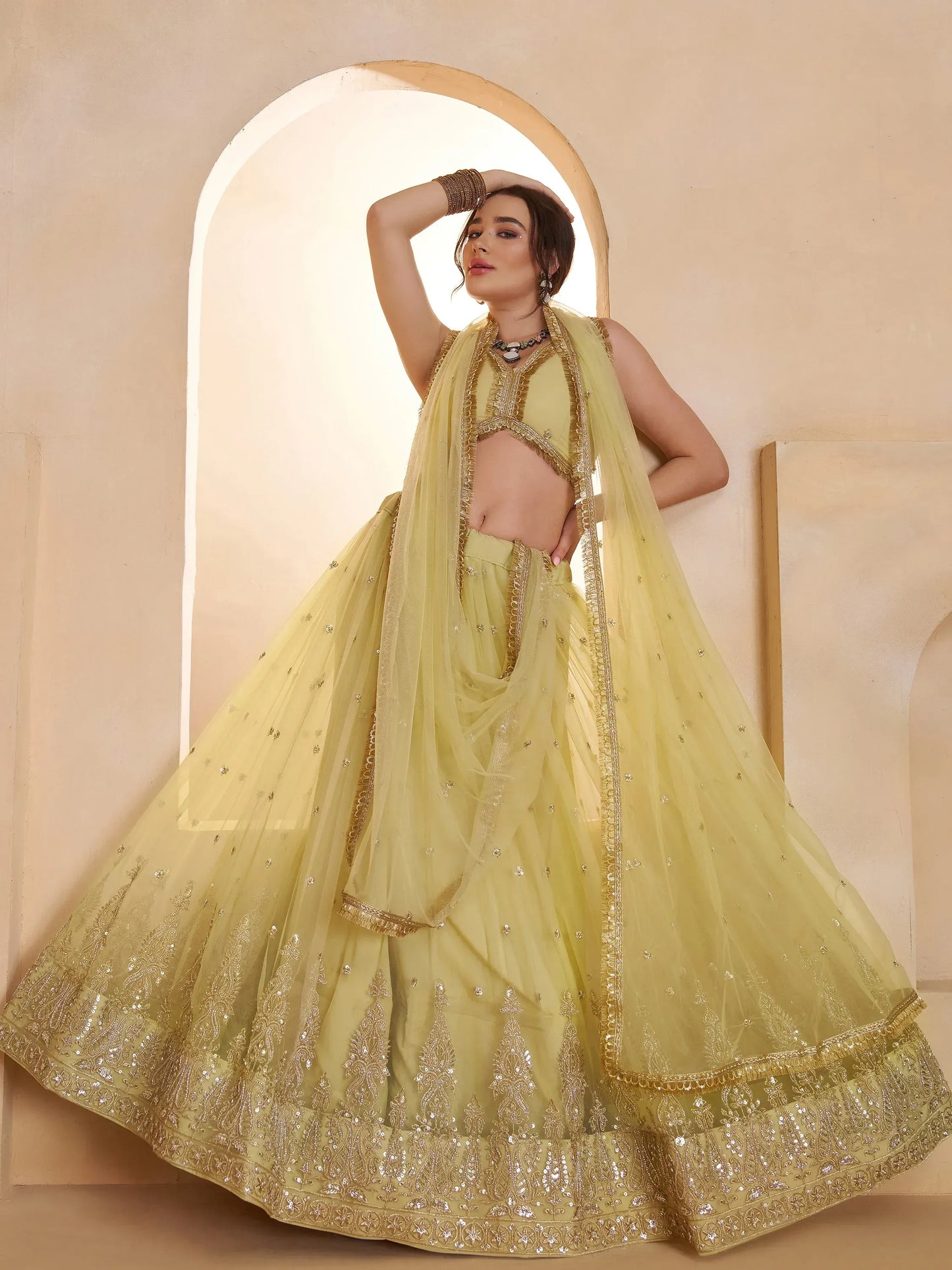 Pastel Sequins Net Embroidered Wedding Wear Lehenga Choli With Dupatta