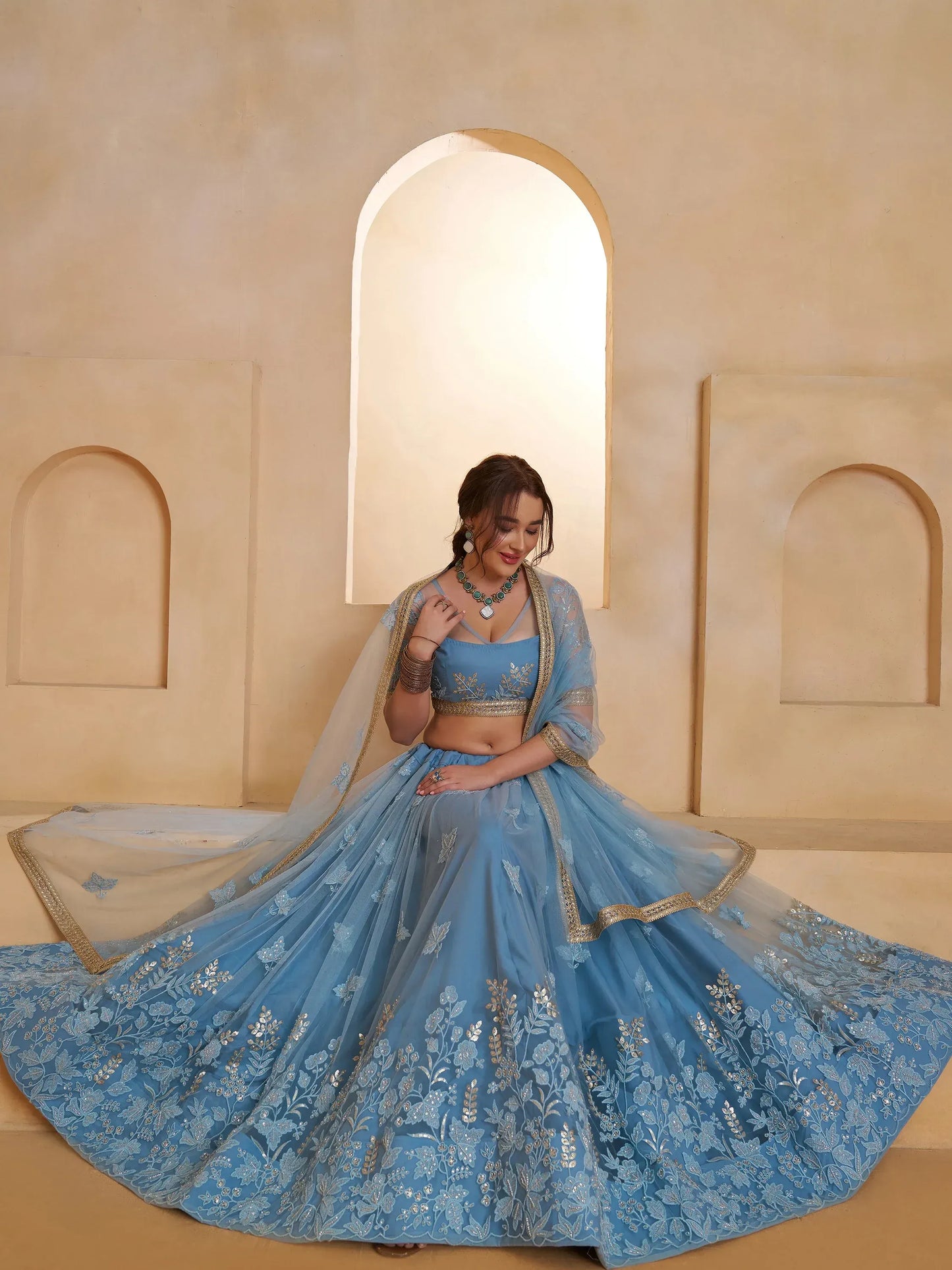 Pastel Sequins Net Embroidered Wedding Wear Lehenga Choli With Dupatta