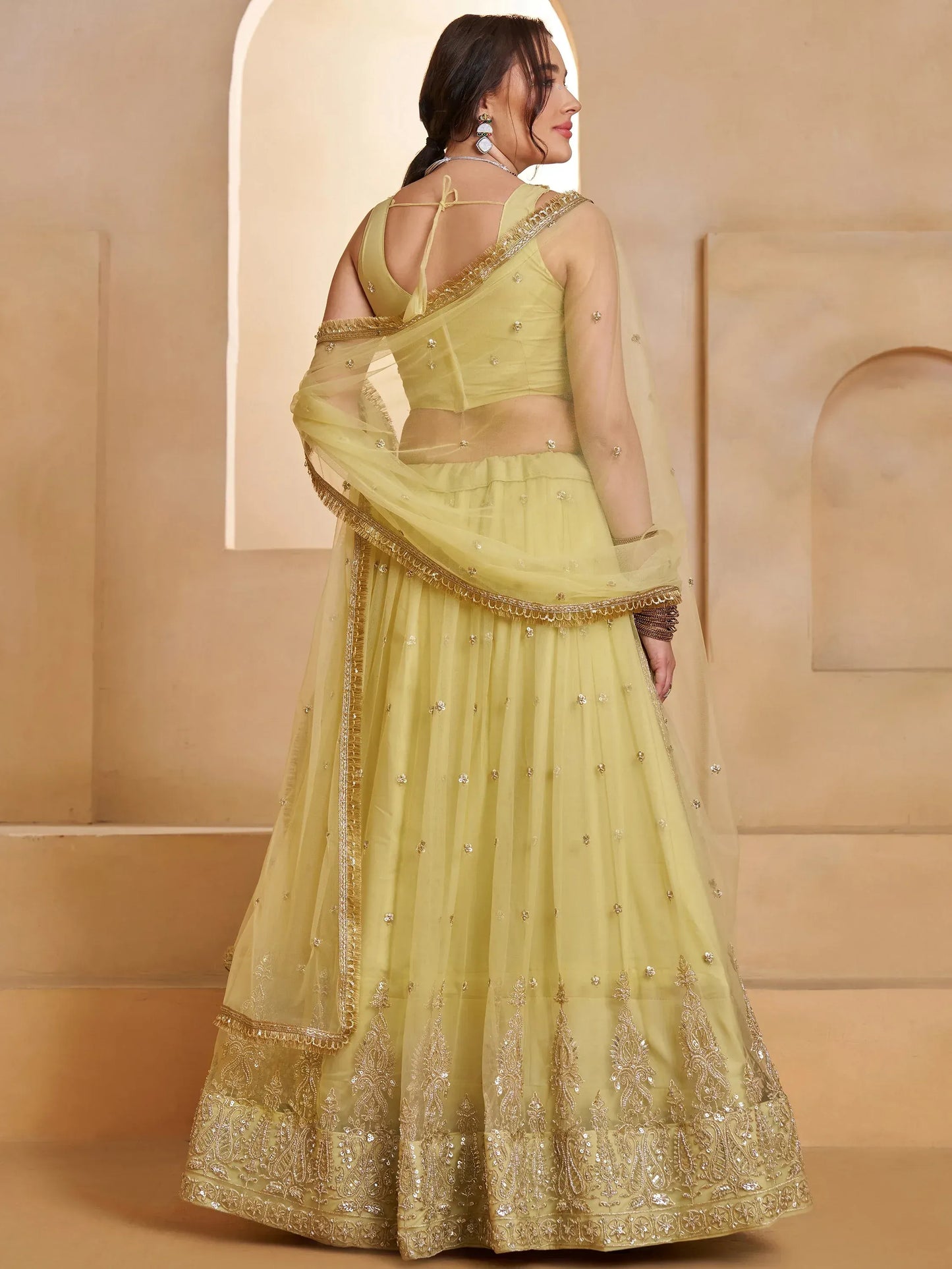 Pastel Sequins Net Embroidered Wedding Wear Lehenga Choli With Dupatta