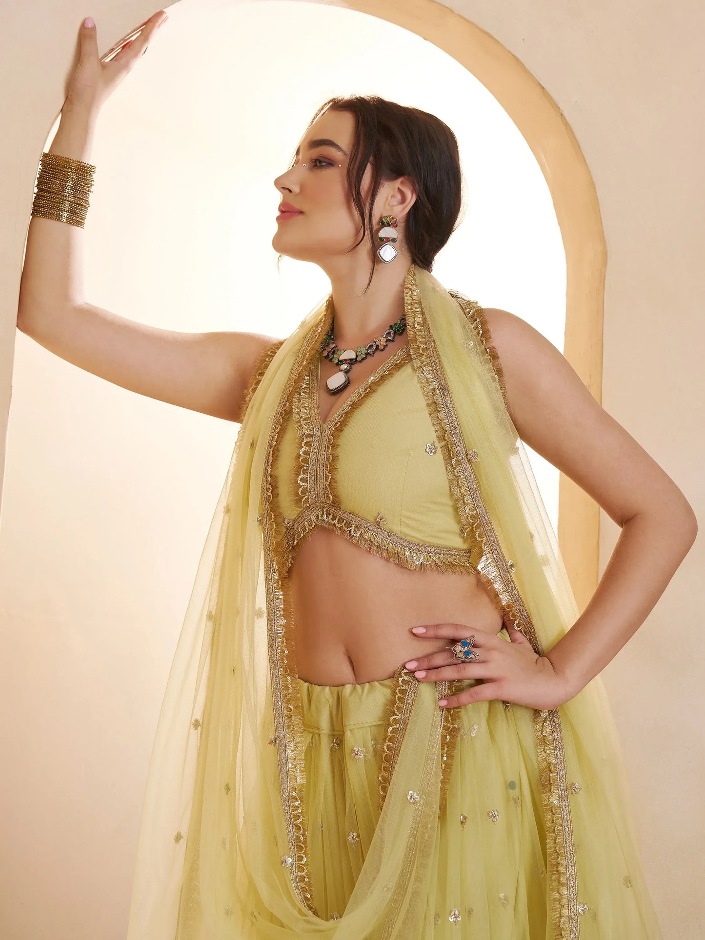 Pastel Sequins Net Embroidered Wedding Wear Lehenga Choli With Dupatta