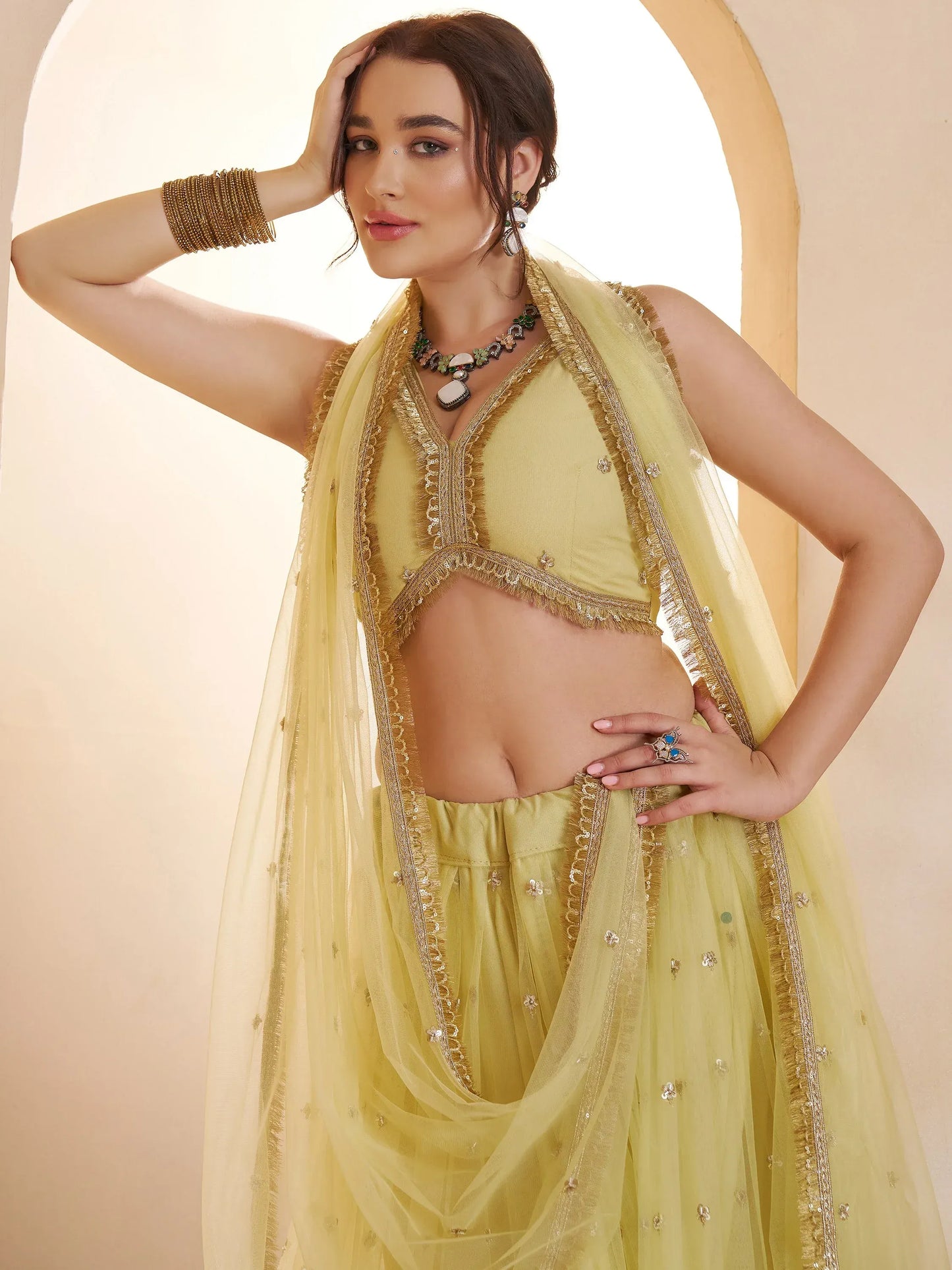 Pastel Sequins Net Embroidered Wedding Wear Lehenga Choli With Dupatta