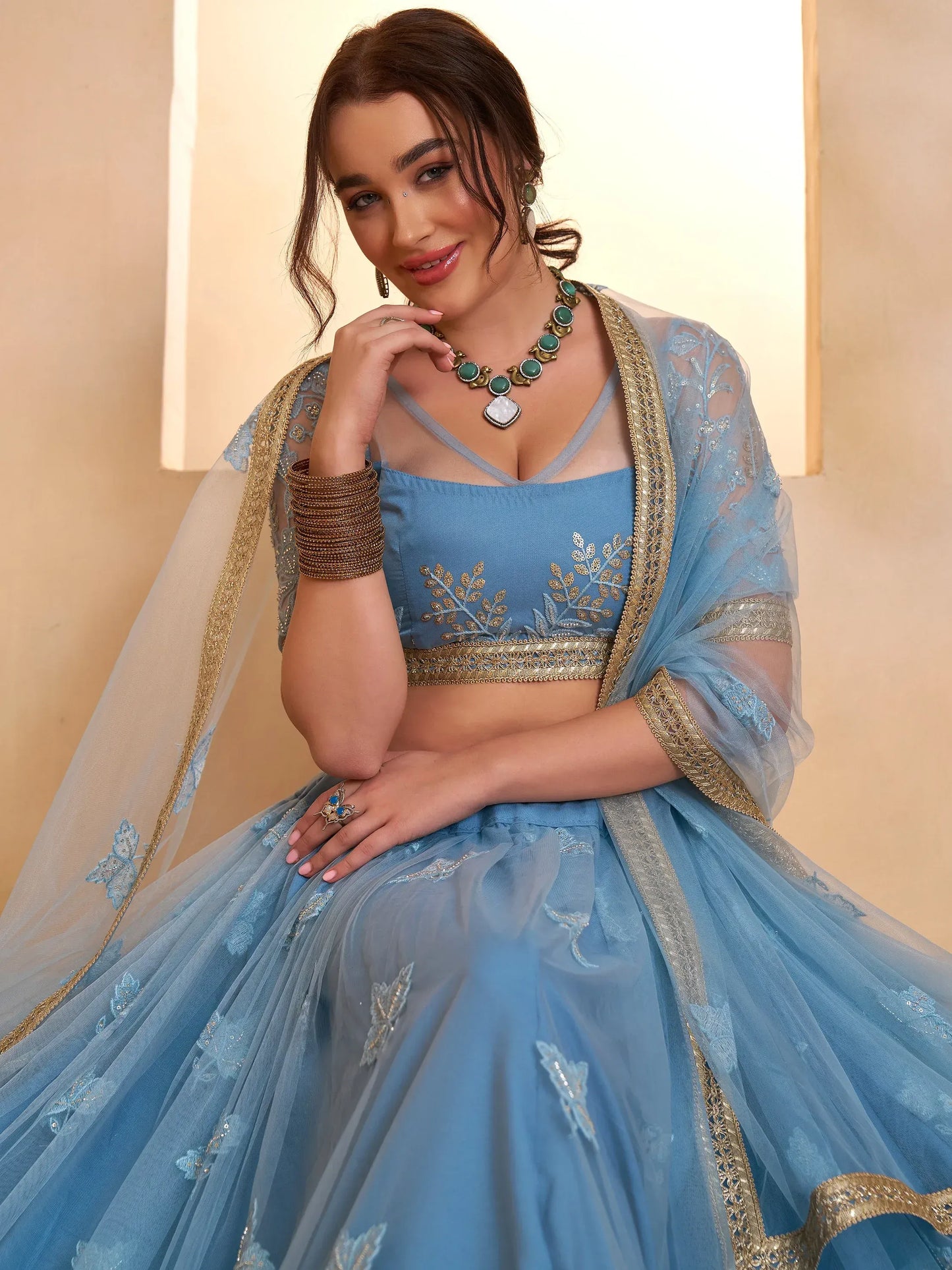 Pastel Sequins Net Embroidered Wedding Wear Lehenga Choli With Dupatta