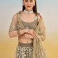 Alluring Brown Net Thread Embroidered Reception Wear Lehenga Choli