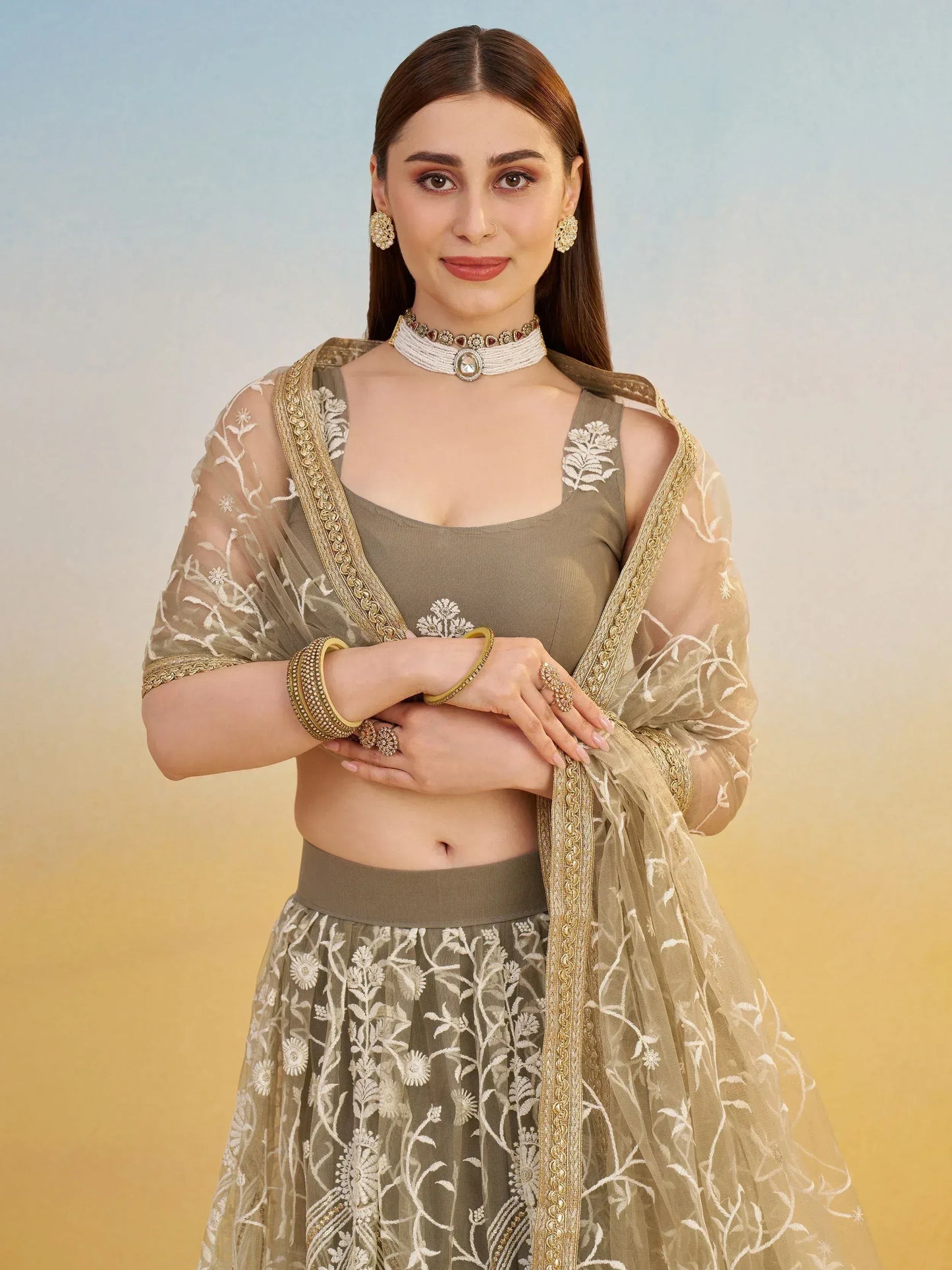 Alluring Brown Net Thread Embroidered Reception Wear Lehenga Choli
