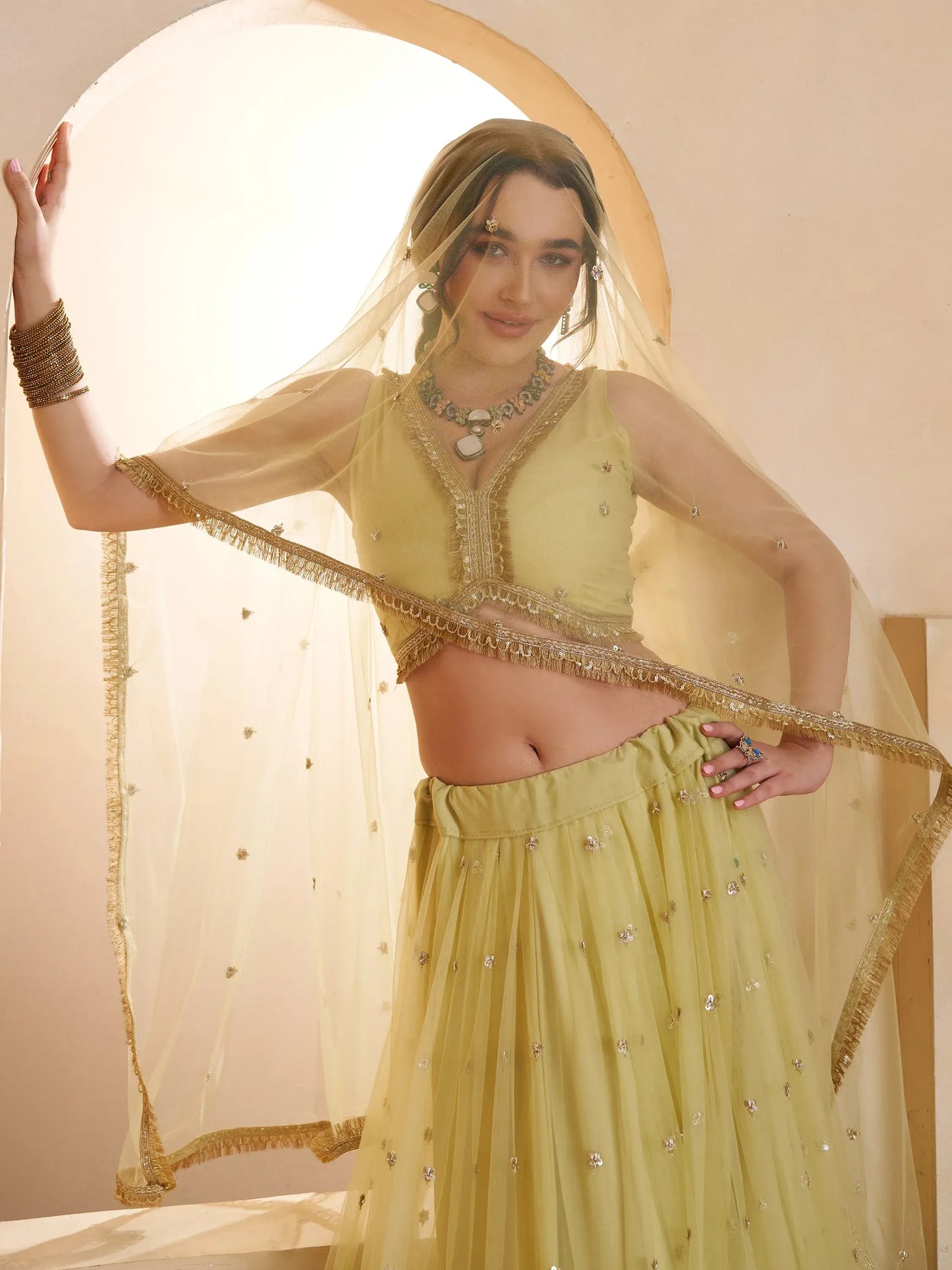 Pastel Sequins Net Embroidered Wedding Wear Lehenga Choli With Dupatta