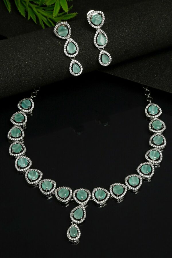 Yellow Chimes Rhodium-Plated Green & White AD-Studded Jewellery Set