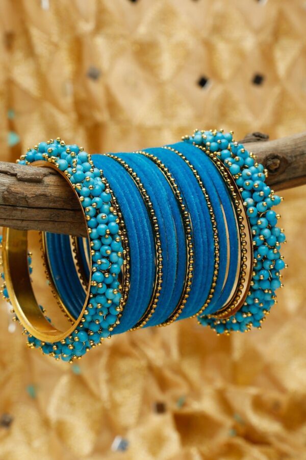 Shining Diva Blue Set Of 23 Gold Plated Bangles
