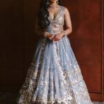 Gorgeous Sky Blue Zari Work Net Wedding Wear Lehenga Choli