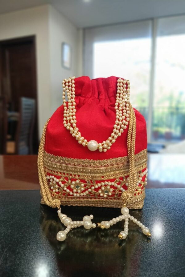 Embroidered-potli