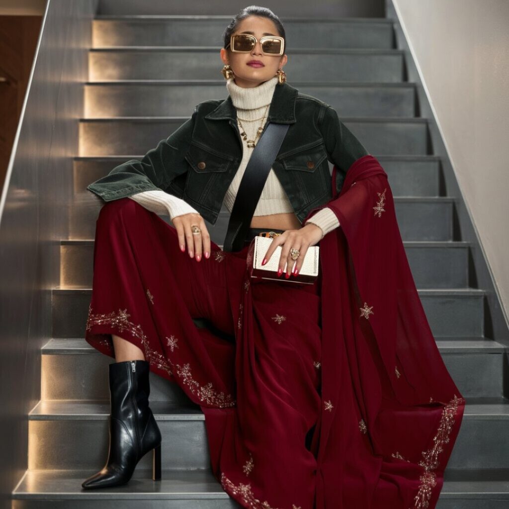 deep maroon saree with cropped dark green denim jacket