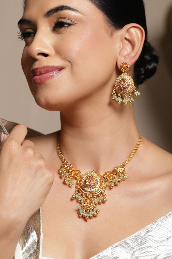 Rubans 22K Gold-Plated Bird Motif Handcrafted Brass Jewellery Set with Pink & Green Beads