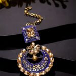 ANIKAS CREATION Gold-Plated & Blue Stone Studded Enameled Hand Painted Traditional Maang Tikka