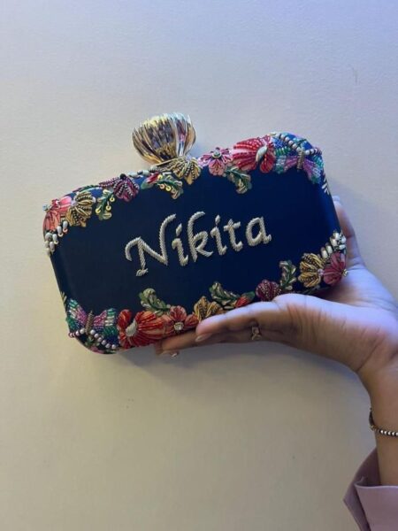 Rose Knob Highlighted Embroidered Name Clutch