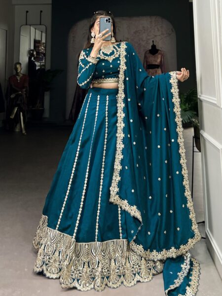 Magnificent Teal Blue Embroidered Vichitra Silk Engagement Wear Lehenga Choli